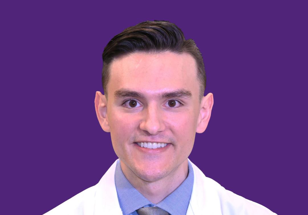 Headshot of Dr Ryan Luessen