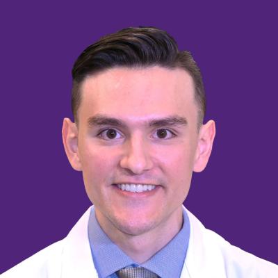 Headshot of Dr Ryan Luessen