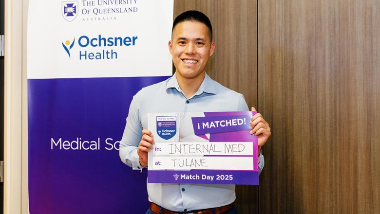 Nathan Au-Yeung holding a card with 'I Matched!'