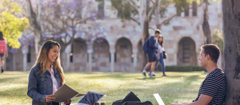 Students sitting in Great Court at St Lucia campus